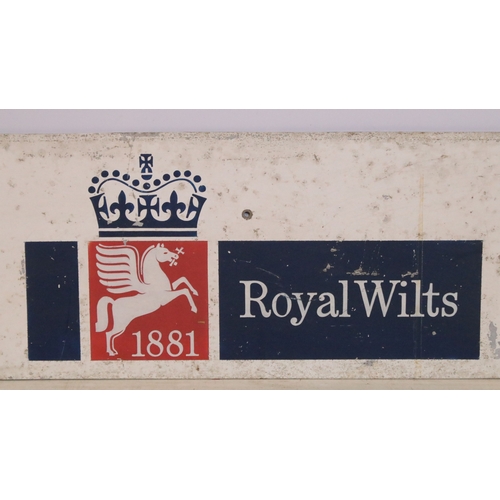 153 - Royal Wilts - 1881 Pegasus logo metal sign, H 30.5cm, W 122cm