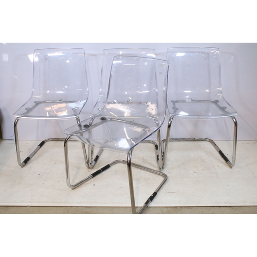 653 - Set of four perspex and chromed metal chairs, having cantilever design, W 45cm x H 83cm (4)