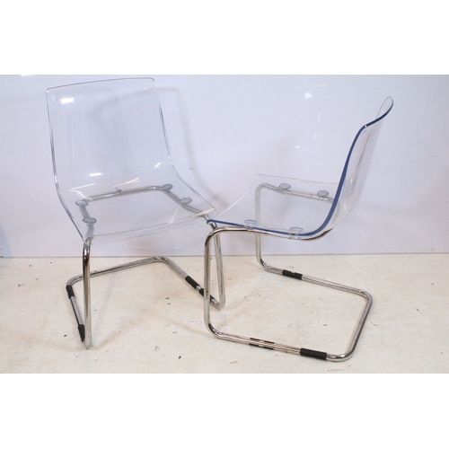 653 - Set of four perspex and chromed metal chairs, having cantilever design, W 45cm x H 83cm (4)