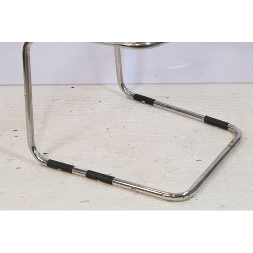 653 - Set of four perspex and chromed metal chairs, having cantilever design, W 45cm x H 83cm (4)