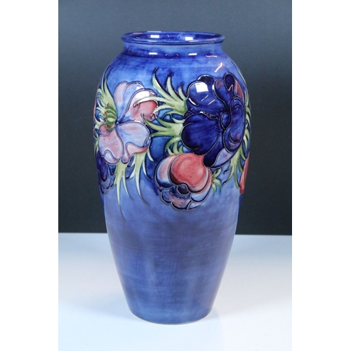 1 - Walter Moorcroft 'Anemone' pattern blue ground baluster vase, impressed marks, paper label and signe... 