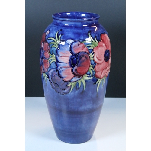 1 - Walter Moorcroft 'Anemone' pattern blue ground baluster vase, impressed marks, paper label and signe... 