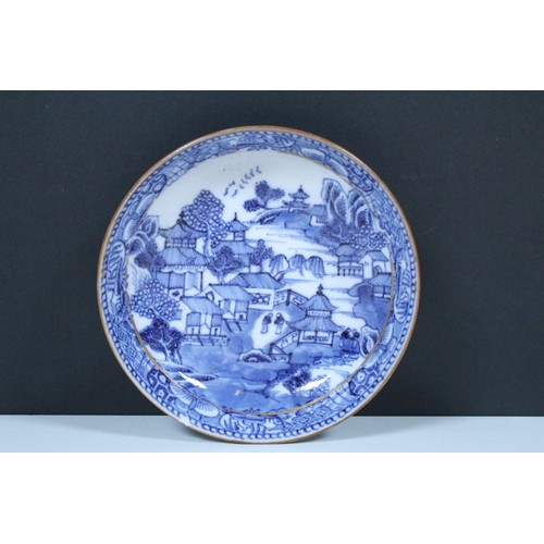 5 - Pair of Chinese blue and white tea bowls and saucers, decorated finely with pagodas and willows, gil... 