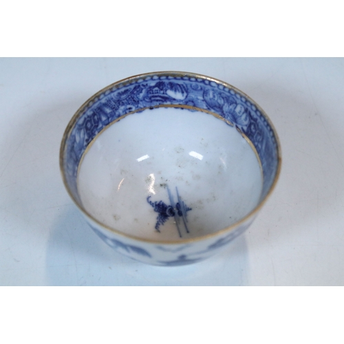 5 - Pair of Chinese blue and white tea bowls and saucers, decorated finely with pagodas and willows, gil... 