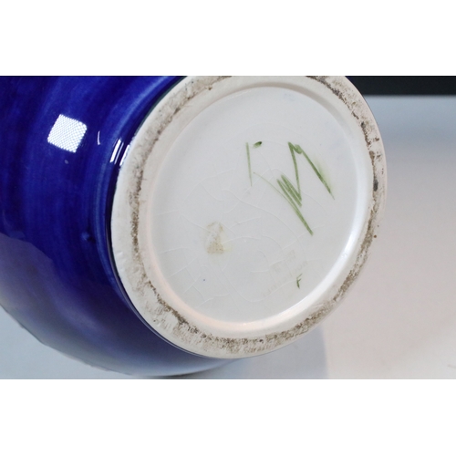 7 - Moorcroft 'Anemone' pattern vase on deep blue ground, impressed and signed to base, H 24cm