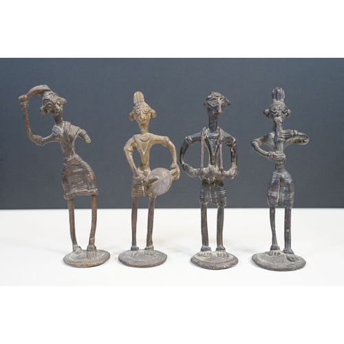 101 - Irish blackthorn shillelagh, 48cm long, a set of four Indian Dhokra figures, each approx 14cm high a... 