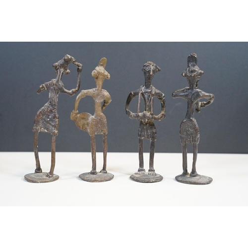 101 - Irish blackthorn shillelagh, 48cm long, a set of four Indian Dhokra figures, each approx 14cm high a... 