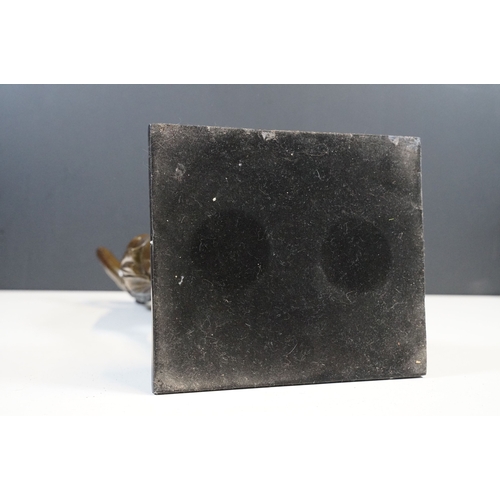 106 - Bronze classical figurine statue of semi nude female in robes resting on pillar, standing atop stepp... 