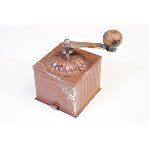 113 - Three vintage toleware coffee grinders of graduating size, one marked F B and another Coff, the larg... 