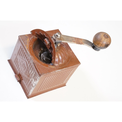 113 - Three vintage toleware coffee grinders of graduating size, one marked F B and another Coff, the larg... 