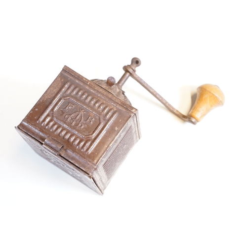 113 - Three vintage toleware coffee grinders of graduating size, one marked F B and another Coff, the larg... 