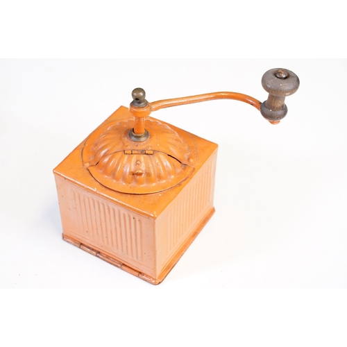 113 - Three vintage toleware coffee grinders of graduating size, one marked F B and another Coff, the larg... 