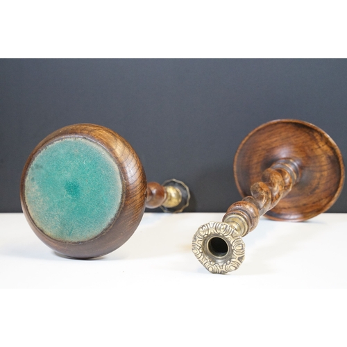 124 - Pair of early 20th century turned oak barley twist candle sticks with circular bases and ornate bras... 