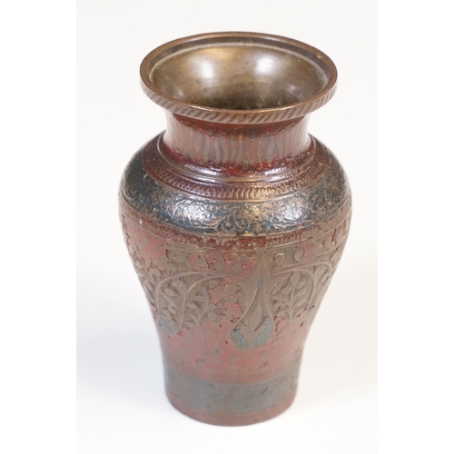 138 - Pair of coiled cobra candlesticks, H 15cm together with a small Indian brass vase, H 9cm (3)