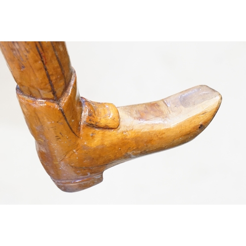 142 - Vintage folk art walking stick, the handle carved in the form of a 17th/18th century boot with buckl... 