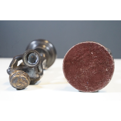 144 - Pair of Indian bronze candelabra candle holders depicting figures holding torches raised on circular... 