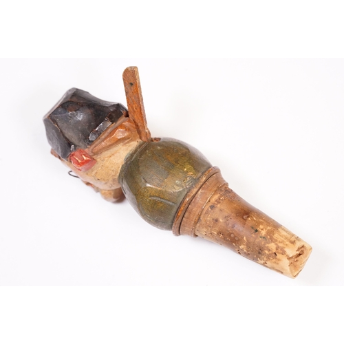 180 - Two vintage novelty folk art carved wooden and cork figural wine bottle stoppers, probably German