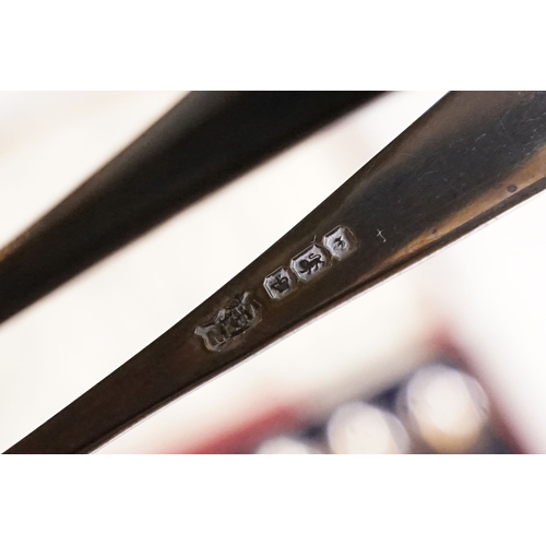 209 - A cased set of twelve fully hallmarked sterling silver teaspoons complete with sugar tongs.