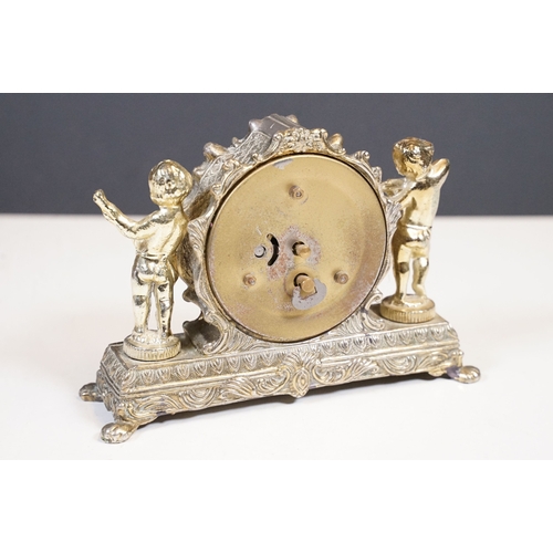212 - West German Splendex mantle clock adorned with musical cherub decoration