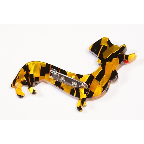 231 - A contemporary Lea Stein style brooch in the form of a Sausage Dog / Dachshund wearing a Top Hat, me... 