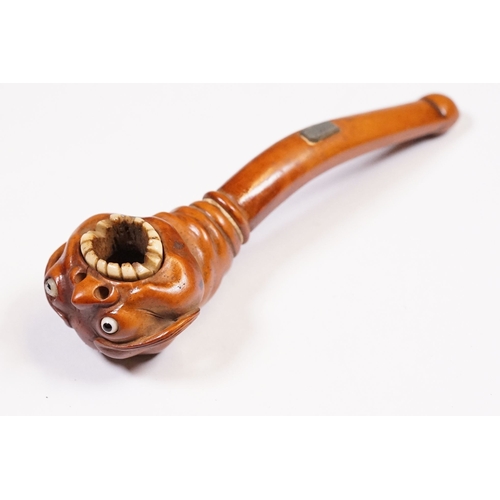 236 - Japanese smoking pipe in the form of a demon, possibly Meiji period with bone inlay, L 11cm