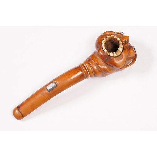 236 - Japanese smoking pipe in the form of a demon, possibly Meiji period with bone inlay, L 11cm