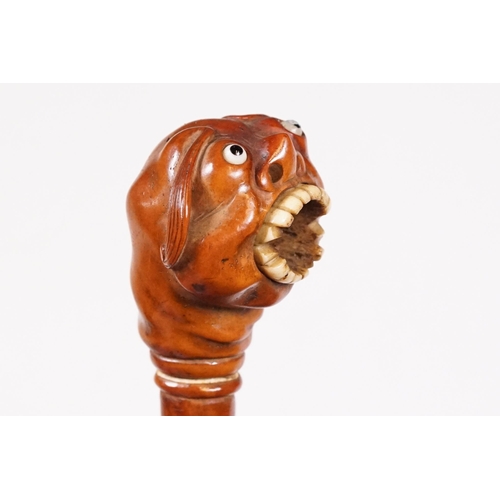 236 - Japanese smoking pipe in the form of a demon, possibly Meiji period with bone inlay, L 11cm