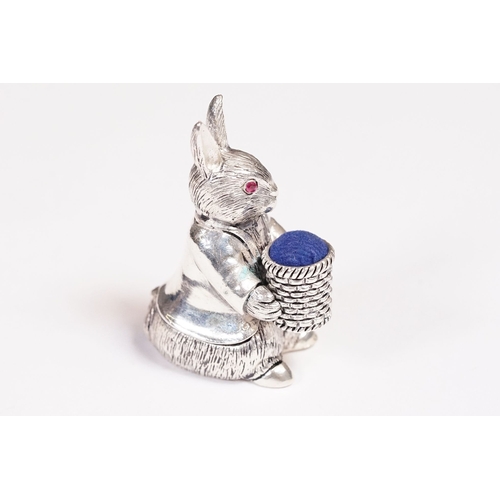 250 - Large silver Beatrix Potter pin cushion.