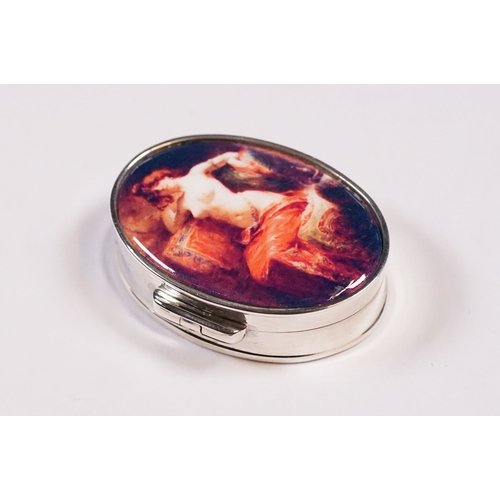 256 - Silver oval shaped pill box with enamel lid.