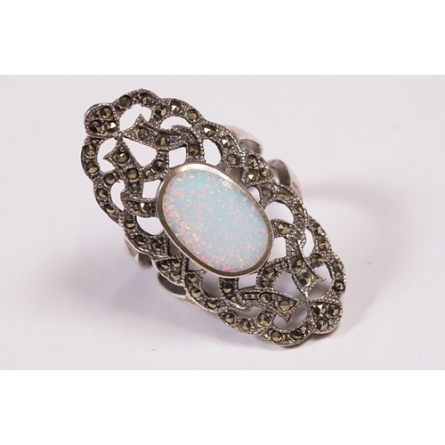 259 - Silver marcasite and opal panel ring.