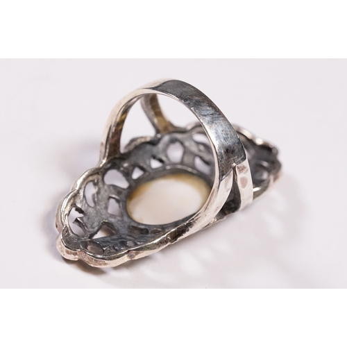 259 - Silver marcasite and opal panel ring.