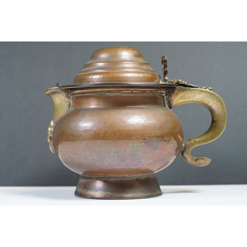 273 - An antique Georgian copper ale tankard set with King George III coin to the lid.