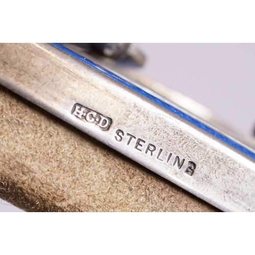 276 - An Art Deco fully hallmarked sterling silver and blue guilloche enamel vanity set to include brush a... 