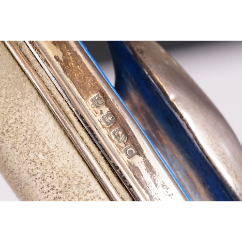 276 - An Art Deco fully hallmarked sterling silver and blue guilloche enamel vanity set to include brush a... 