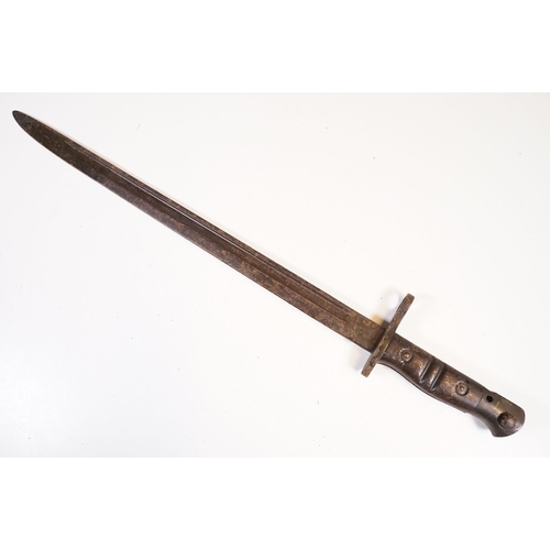 279 - A collection of knives and bayonets to include a French cruciform 1886 Label example.