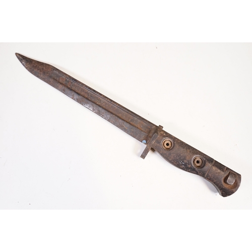 279 - A collection of knives and bayonets to include a French cruciform 1886 Label example.