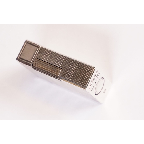 267A - Boxed cigarette lighter by Dupont, Paris.