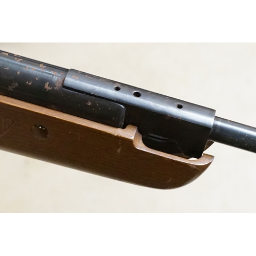 287 - A SMK19 .22 Cal break barrel air rifle with contemporary green soft gun carry case.