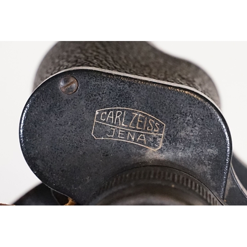 289 - A pair of Carl Zeiss Jena Jenoptem 8x30W field binoculars within original case together with a pair ... 