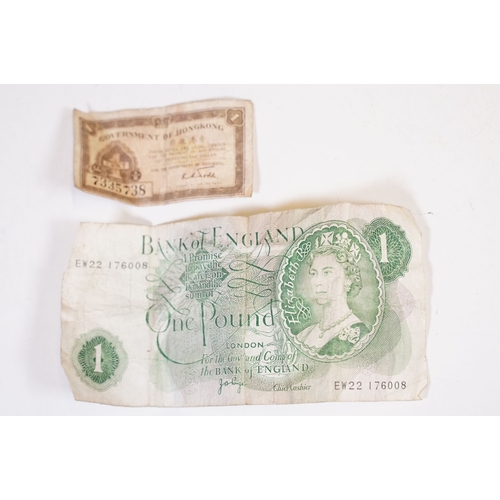 295 - A small group of mixed collectables to include vesta cases, pipe tampers, powder compact, coins ...e... 