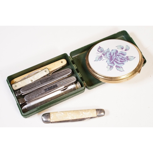 295 - A small group of mixed collectables to include vesta cases, pipe tampers, powder compact, coins ...e... 