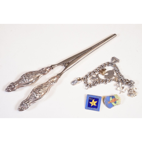 295 - A small group of mixed collectables to include vesta cases, pipe tampers, powder compact, coins ...e... 