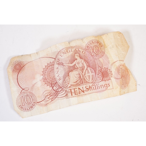 295 - A small group of mixed collectables to include vesta cases, pipe tampers, powder compact, coins ...e... 