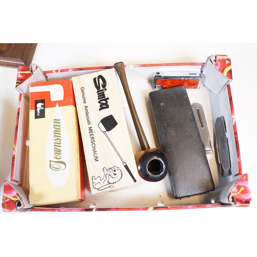 303 - A collection of mixed smoking pipes to include estate pipes, pipe racks, pipe holders, pipe rests...... 