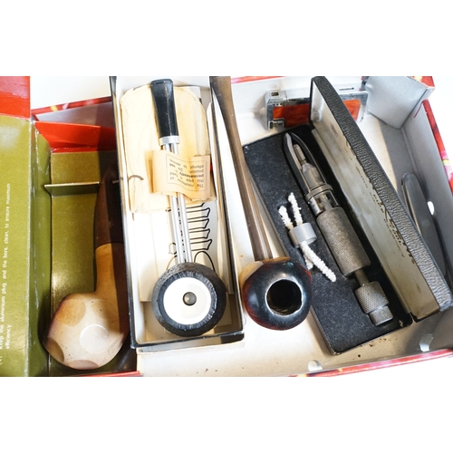 303 - A collection of mixed smoking pipes to include estate pipes, pipe racks, pipe holders, pipe rests...... 