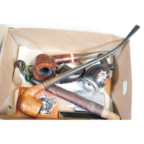 303 - A collection of mixed smoking pipes to include estate pipes, pipe racks, pipe holders, pipe rests...... 