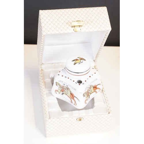 306 - A box of mixed collectables to include tinplate toy, swarovski ornaments, hip flask, oriental white ... 