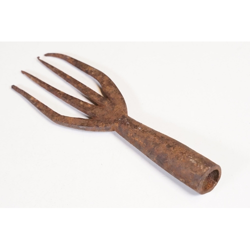 312 - Two early 20th century cast iron  Eel spear / harpoon heads, the largest L 19cm