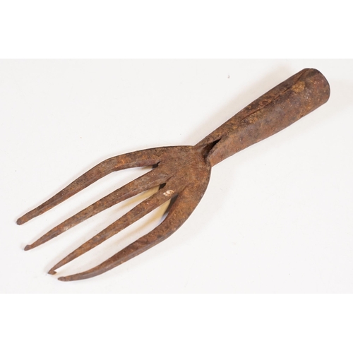 312 - Two early 20th century cast iron  Eel spear / harpoon heads, the largest L 19cm