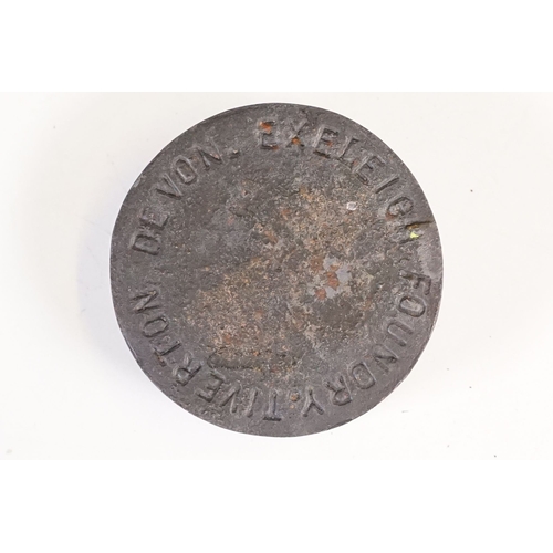 313 - A collection of four cast iron weights commemorating the 1977 silver jubilee of Queen Elizabeth II, ... 